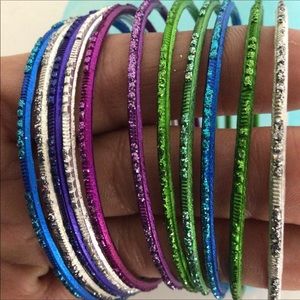 CLAIRES  SET OF TWENTY GLITTER BRACELETS